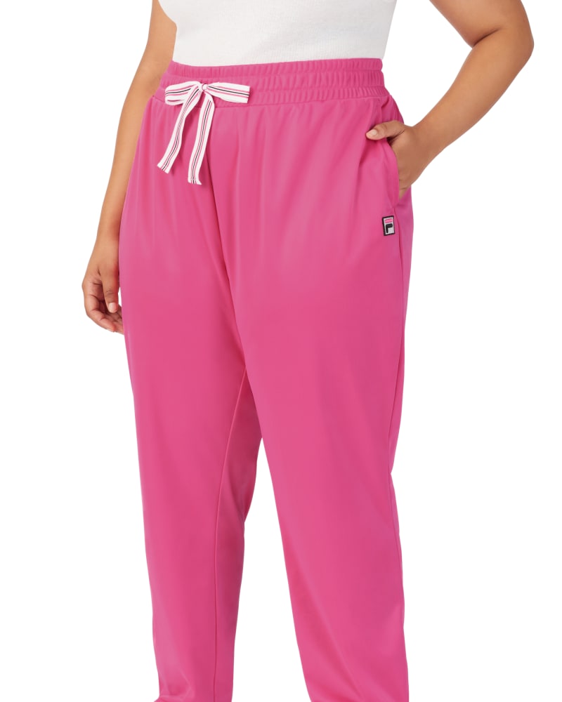 Front of a model wearing a size 1X Day Tripper Pant in Shocking Pink by FILA. | dia_product_style_image_id:252665